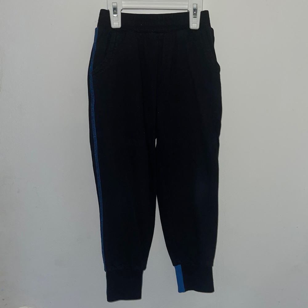 Boy’s black sweatpants with blue stitching (size: 5)